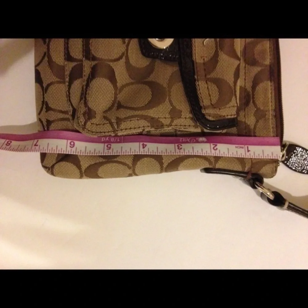 COACH signature c brown crossbody turnlock bag